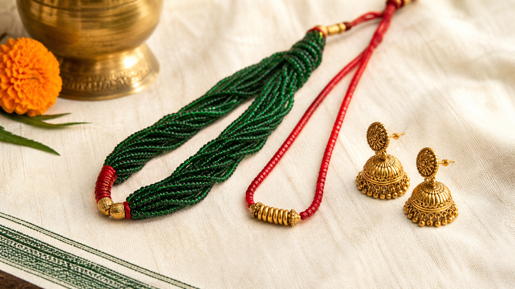 Fresh green potey, a short gold Tilhari and Nepali jhumka arranged for Nepali New Year
