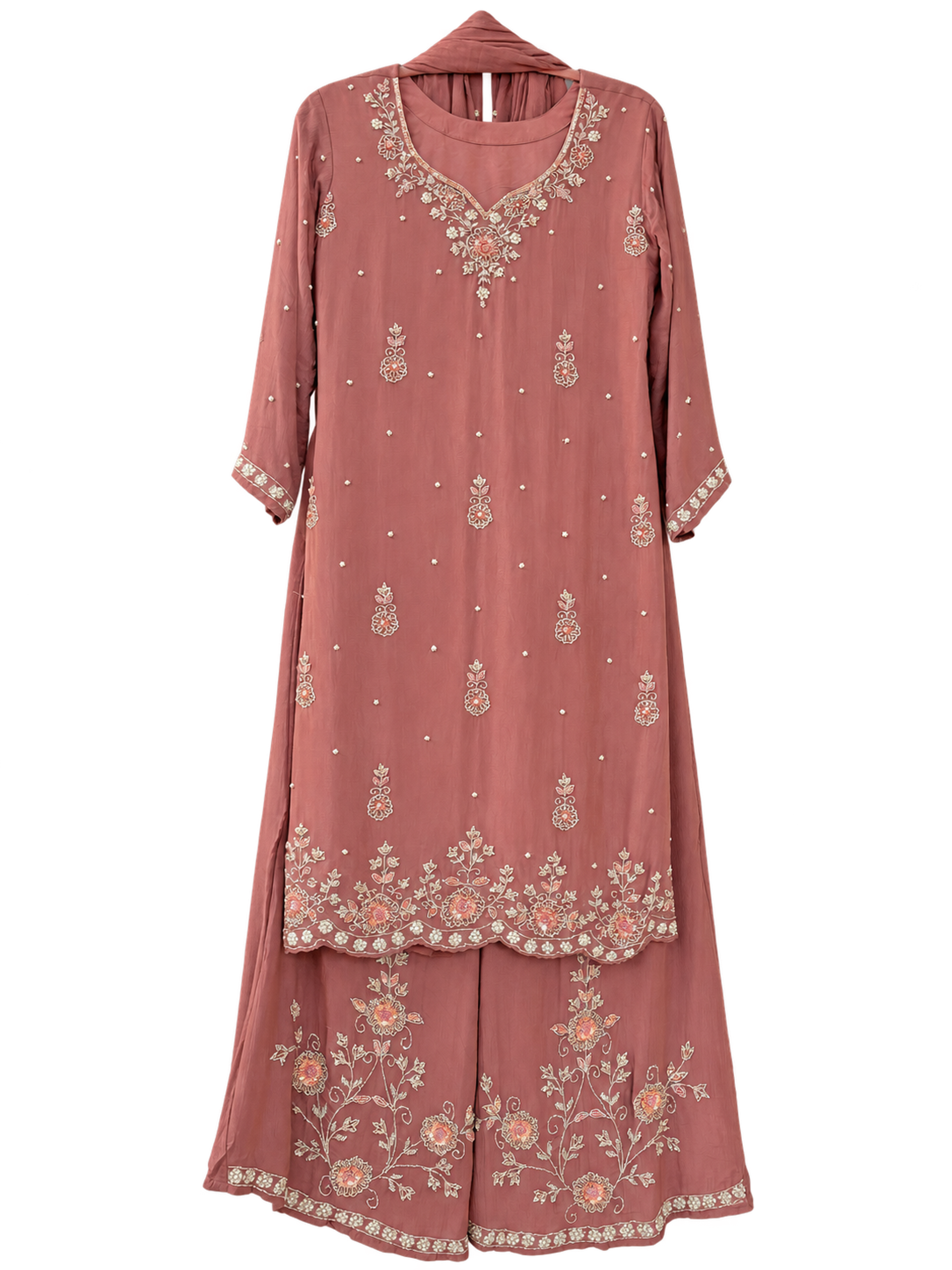 A dusty rose kurta suruwal with cream and peach floral embroidery, wide-leg trousers and a plain dupatta.