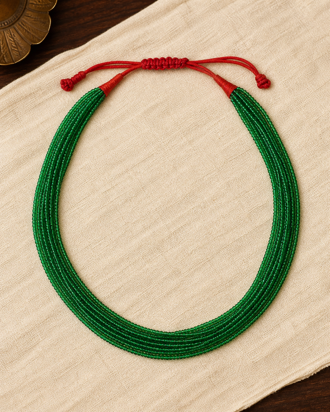 Multi-strand traditional green glass potey necklace